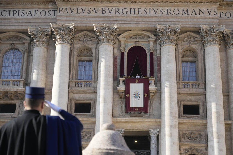 Pope Francis delivers the Urbi et Orbi (Latin for 'to the city and to the world' ) Christmas' day blessing from the main balcony of St. Peter's Basilica at the Vatican, Sunday, Dec. 25, 2022. (AP Photo/Gregorio Borgia)