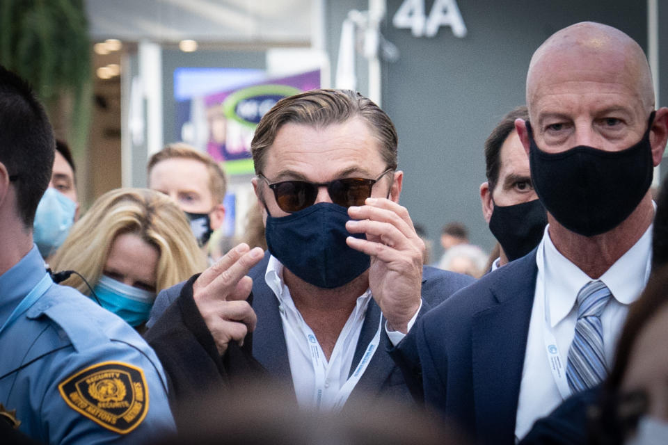 Leonardo DiCaprio walks through the exhibition hall after attending an event at the Cop26 summit in Glasgow. Picture date: Tuesday November 2, 2021.