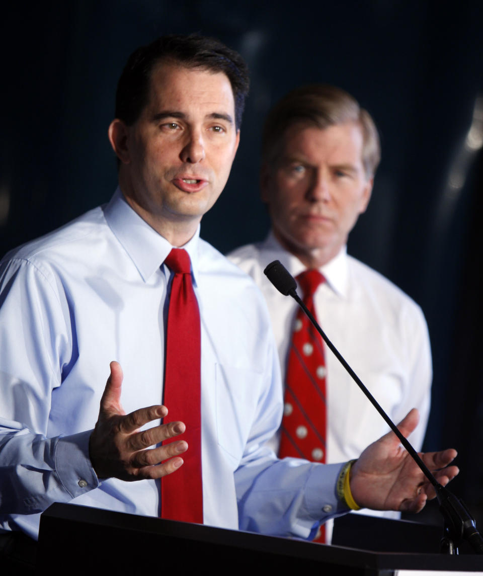 Wisconsin Gov. Scott Walker, left, and Virginia Gov. Bob McDonnell, right, during a news conference at Copland Trucking in Williamsburg, Va., Friday, July 13, 2012. before the start of the National Governors Association meeting. McDonnell and Walker are two of the governors attending the National Governors Association meeting in Williamsburg. (AP Photo/Richmond Times-Dispatch, Bob Brown)