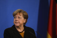 German Chancellor Angela Merkel briefs the media after a virtual meeting with federal state governors at the chancellery in Berlin, Germany, Tuesday, March 30, 2021. German health officials agreed Tuesday to restrict the use of AstraZeneca's coronavirus vaccine in people under 60 amid fresh concern over unusual blood clots reported from those who received the shots. (AP Photo/Markus Schreiber, pool)