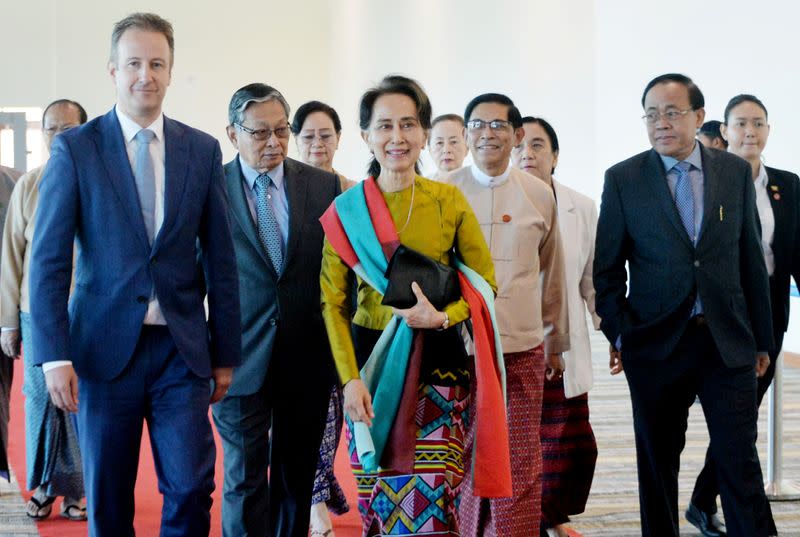 Myanmar's State Counsellor Aung San Suu Kyi departs from Naypyidaw International Airport ahead of her appearance at the International Court of Justice to defend the country against charges of genocide of its Rohingya Muslim minority