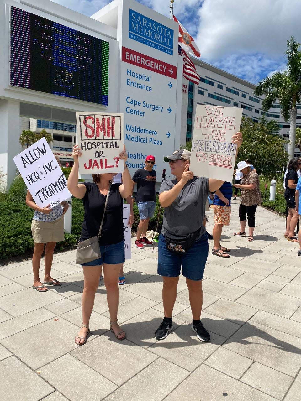 Protesters demonstrated outside Sarasota Memorial Hospital last year after a doctor who was being treated for COVID-19 accused the hospital of mistreating him and providing inadequate treatment to another COVID-19 patient. That doctor's claims have become an issue in Sarasota County Hospital Board races this year.