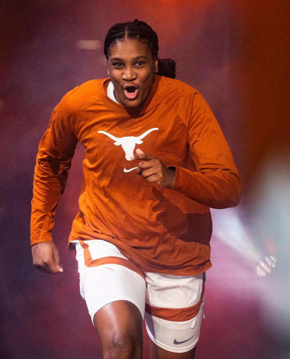 Texas forward Madison Booker runs onto the court at Moody Center ahead of the Longhorns' 80-35 season-opening victory over Southern on Nov. 8. It was the heralded freshman's first college game. Two months later, she has already established herself as one of the team's most important players.