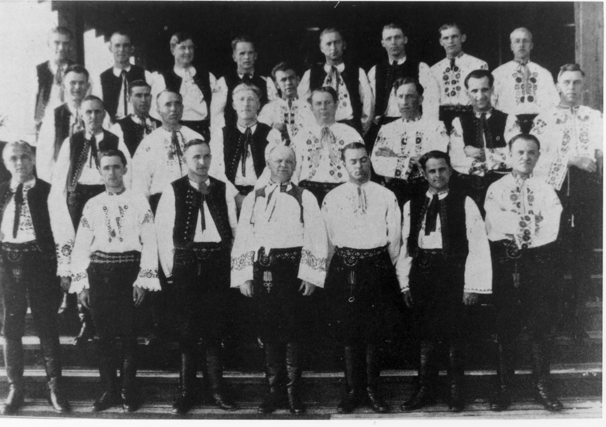 Posed in their colorful bohemian uniforms, the Czecho-Slovakian National Band, 1927.