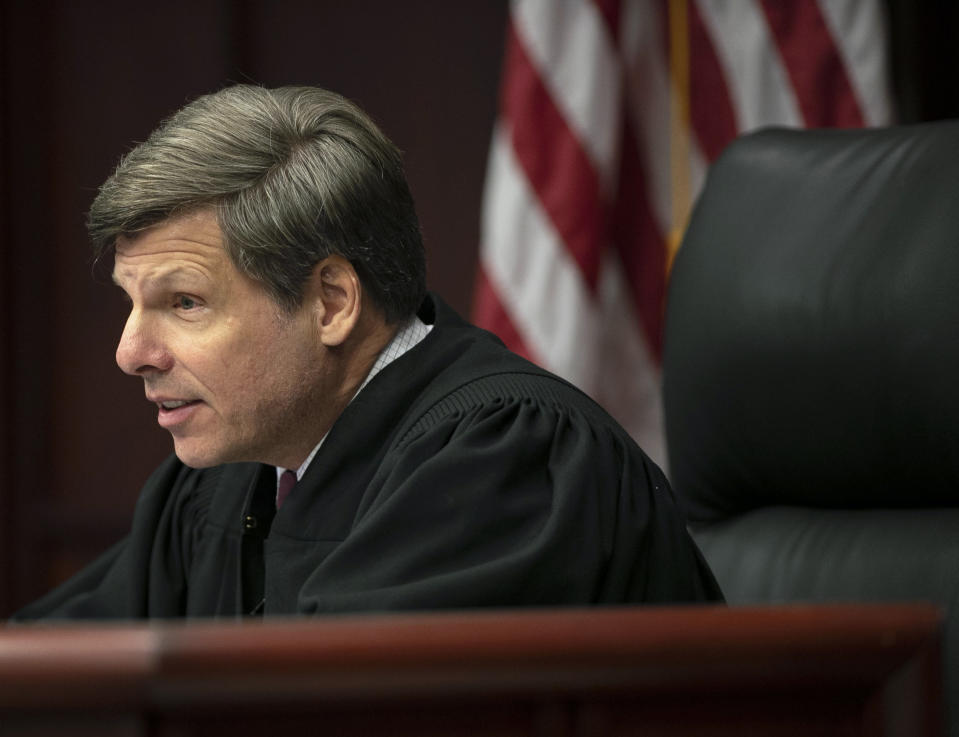 Senior Resident Superior Court Judge Paul C. Ridgeway issues his ruling following a hearing during the Mark E. Harris v. NC State Board of Elections hearing on Tuesday, Jan. 22, 2019, in Superior Court in Raleigh, N.C. (Robert Willett/The News & Observer via AP, Pool)