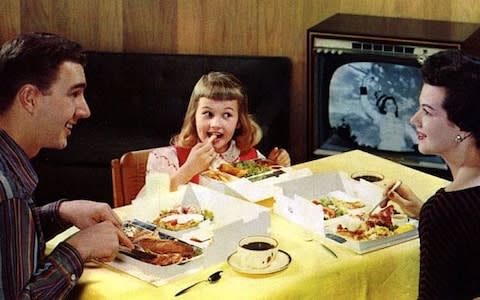 People have been eating in front of the television for decades and now nearly half of meals are consumed in front of the box