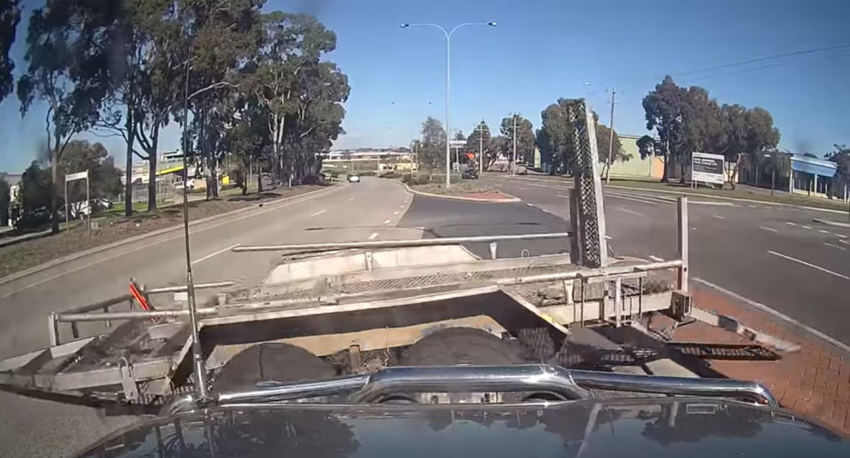 The car with the dashcam was almost hit by the rogue trailer. Source: Dash Cam Owners Australia