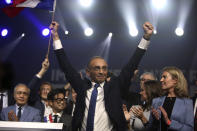 French far right presidential candidate Eric Zemmour, waves after his first rally, Sunday, Dec. 5, 2021 in Villepinte, north of Paris. Far-right former French TV pundit Eric Zemmour is holding his first campaign rally, a few days after he formally declared his candidacy for April's presidential election in a video relaying his anti-migrants, anti Islam views. A first round is to be held on April, 10, 2022 and should no candidate win a majority of the vote in the first round, a runoff will be held between the top two candidates on April 24, 2022. (AP Photo/Rafael Yaghobzadeh)