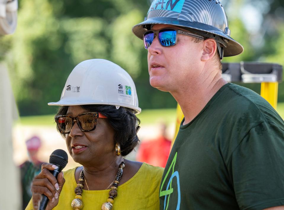 Carolyn Goodwin, president of the Magnolia-Castalia Neighborhood Association, joined Alan Massing, Memphis Habitat associate director of new homes, in addressing future Habitat homebuyers, volunteers and donors Aug. 17. Goodwin, who has lived in the Magnolia-Castalia area throughout her life, welcomed the future homebuyers to the community.