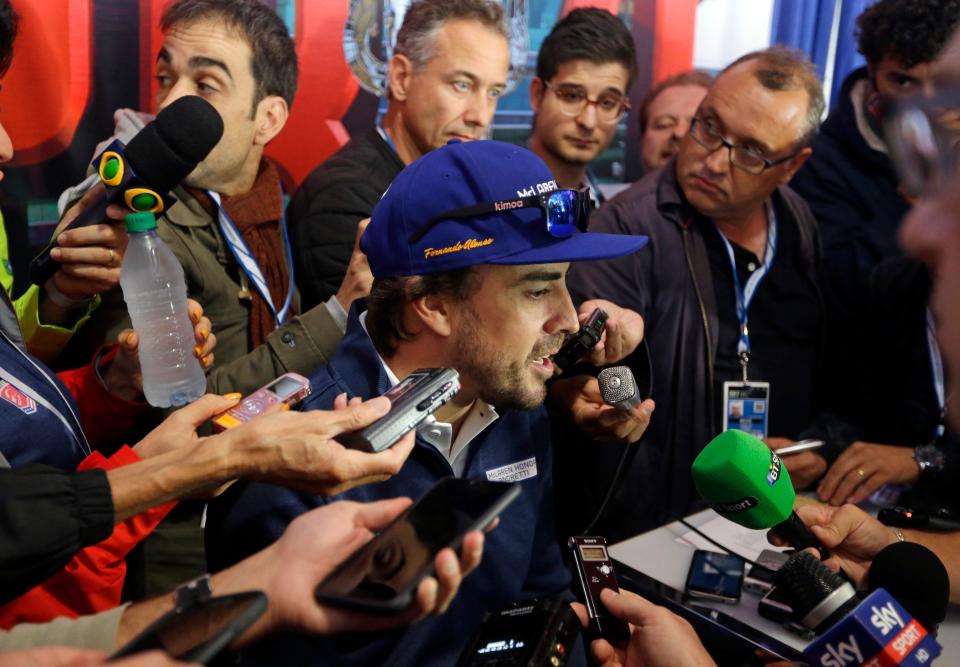 Fernando Alonso, of Spain, answers a question during a press conference for the Indianapolis 500 IndyCar auto race at Indianapolis Motor Speedway, Thursday, May 25, 2017 in Indianapolis. (AP Photo/Michael Conroy)