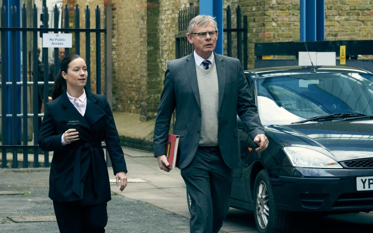Katie Lyons as DS Jo Brunt and Martin Clunes as DCI Colin Sutton