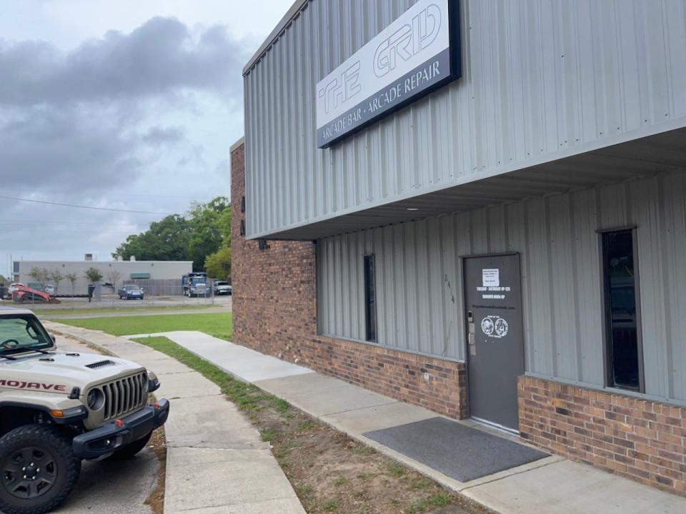 The Grid Arcade Owner Daniel Demeter had an additional sidewalk constructed on his property in order to reach compliance on a county ordinance to obtain his beer and wine license.