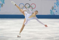 Carolina Kostner of Italy competes in the women's team short program figure skating competition at the Iceberg Skating Palace during the 2014 Winter Olympics, Saturday, Feb. 8, 2014, in Sochi, Russia. (AP Photo/Ivan Sekretarev)