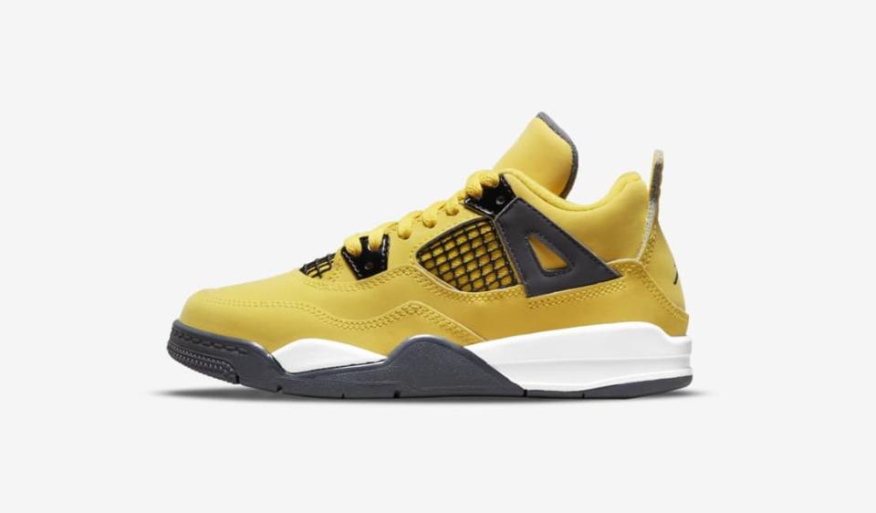 The little kids’ version of the Air Jordan 4 “Tour Yellow.” - Credit: Courtesy of Nike