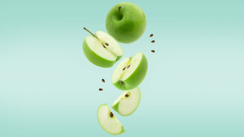levitating green apple