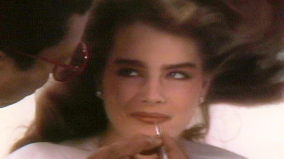 This image released by ABC News Studios shows an image of actress-model Brooke Shields as a child having make-up applied for a photo shoot in a scene from the documentary "Pretty Baby: Brooke Shields." (ABC News Studios via AP)