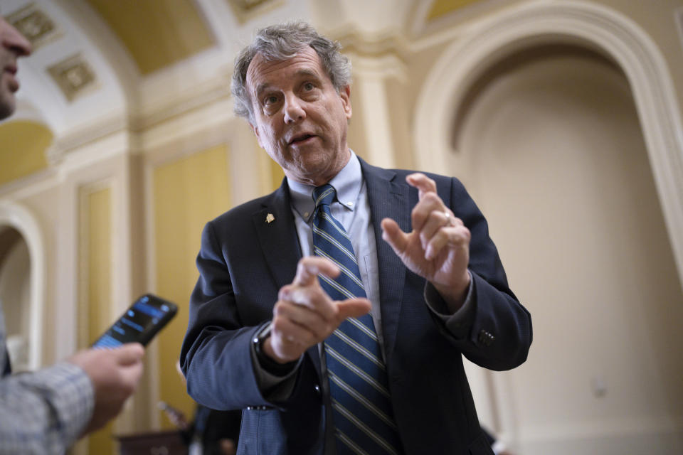 FILE - Senate Banking Committee Chairman Sherrod Brown, D-Ohio, speaks with reporters at the Capitol in Washington, March 15, 2023. Republicans are watching two hot-button federal races in Ohio on Tuesday, March 19, 2024, that could affect their chances for potentially pivotal pickups this fall. One is the Republican primary to face Brown this fall. Brown is considered among the year's most vulnerable Democrats. (AP Photo/J. Scott Applewhite, File)