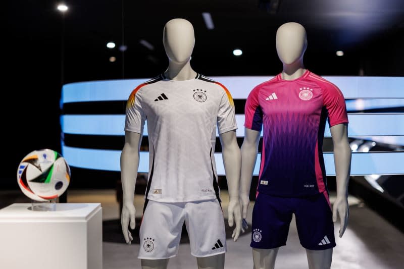 The official jerseys of the German national soccer team for the upcoming European Football Championship 2024 (UEFA EURO 2024) are on display at the headquarters of sporting goods manufacturer adidas AG. Daniel Karmann/dpa