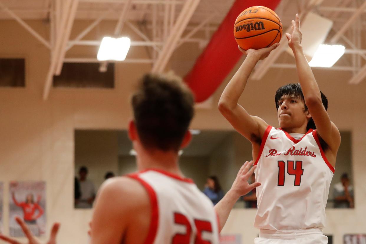 Madison County's Chris Rhodes (14) takes a shot during a GHSA playoff basketball game between Northwest Whitfield and Madison County in Danielsville, Ga., on Wednesday, Feb. 22, 2023. Madison County won 74-49.