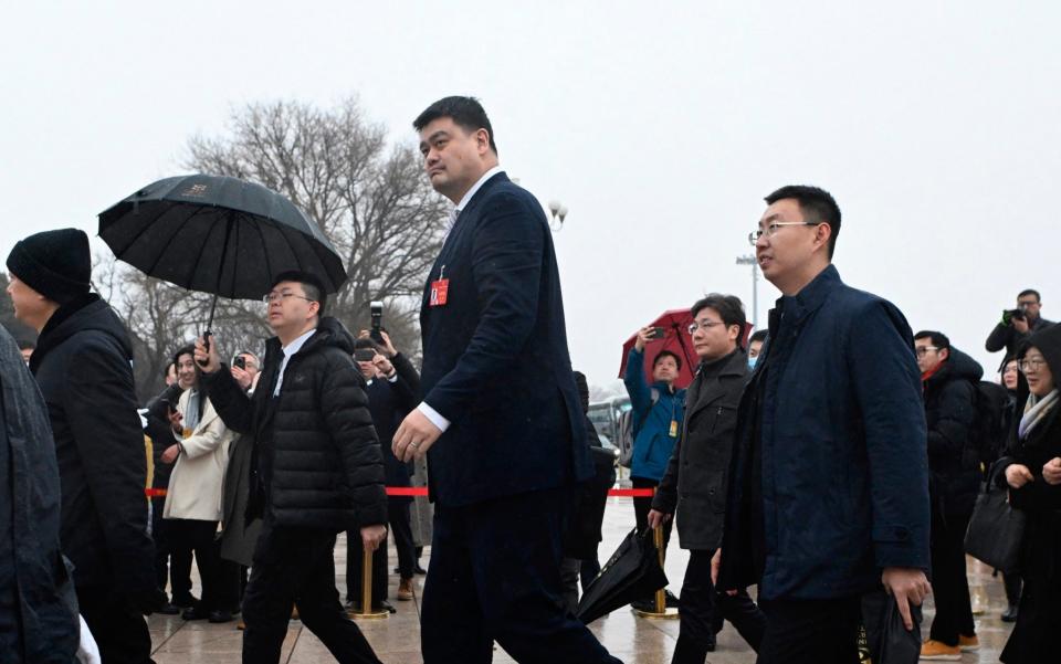 Mr Ming, current chairman of the Chinese Basketball Association, arriving at the Great Hall of People in Bejing