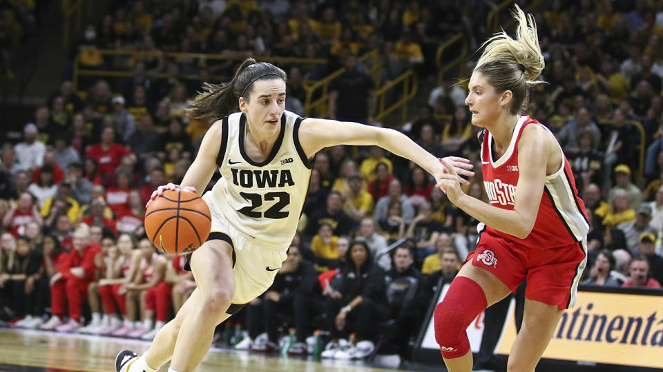 IOWA CITY, IOWA- MARCH 3: Guard Caitlin Clark #22 of the Iowa Hawkeyes goes to the basket during the second half against guard Jacy Sheldon #4 the Ohio State Buckeyes at Carver-Hawkeye Arena on March 3, 2024 in Iowa City, Iowa. (Photo by Matthew Holst/Getty Images)