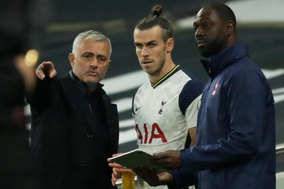 <p>Gareth Bale with Jose Mourinho and Ledley King</p>Pool via REUTERS