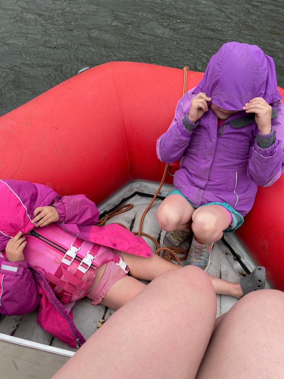 Lucy and Rollie Urness covered themselves up to avoid heavy winds on the John Day River.