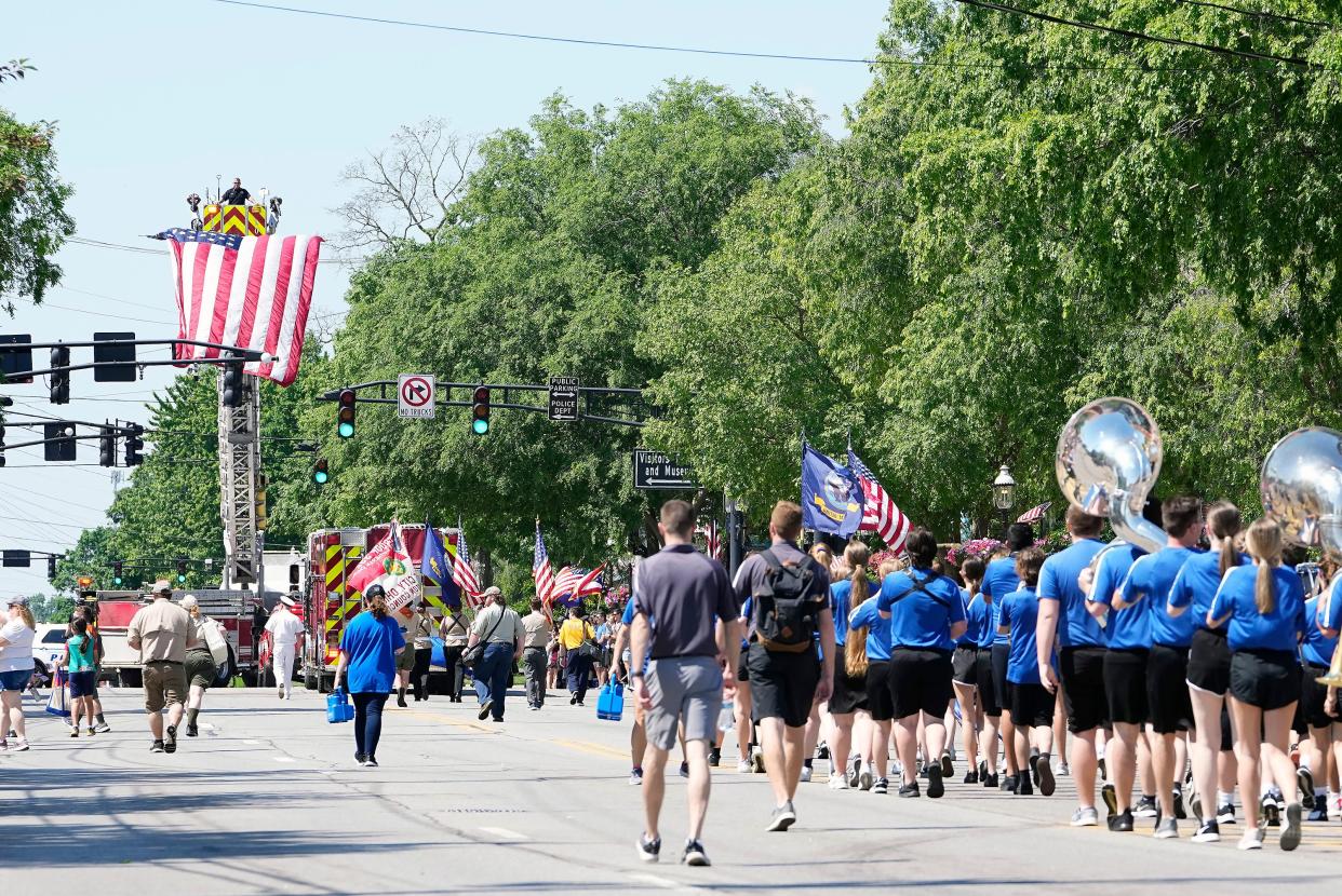 Central Crossing's marching band heads down Broadway during the Grove City Memorial Day parade on May 30, 2022.