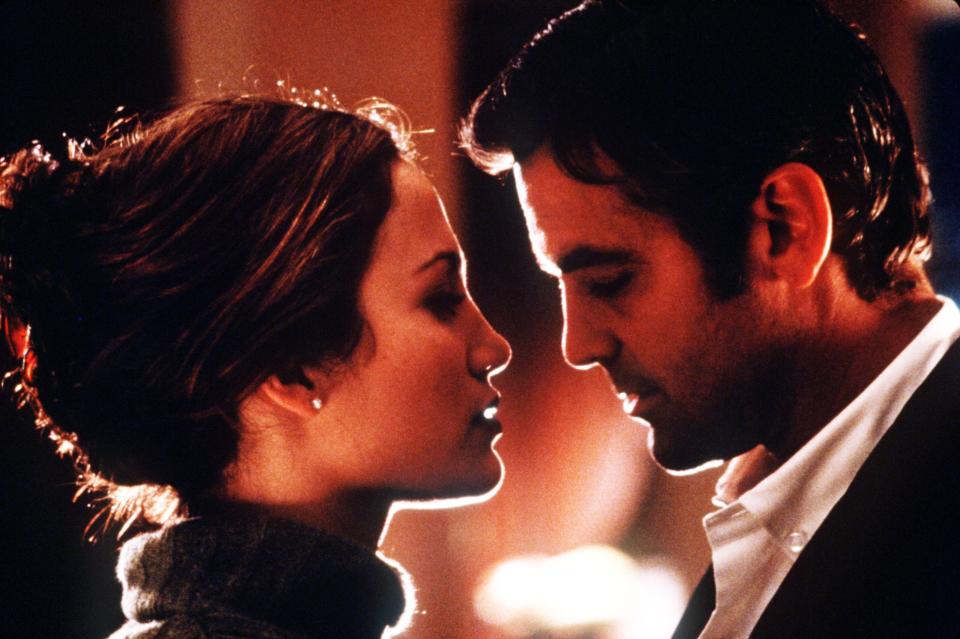 Jennifer Lopez, left, and George Clooney play romantic cat-and-mouse in 1998's "'Out of Sight," Steven Soderbergh's much-praised adaptation of an Elmore Leonard novel.