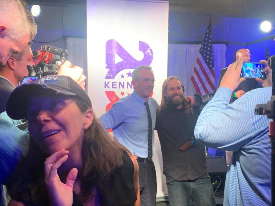 Independent presidential candidate Robert Kennedy Jr. takes a photo with a rally attendee in Columbia, S.C. on Tuesday, Nov. 14, 2023.