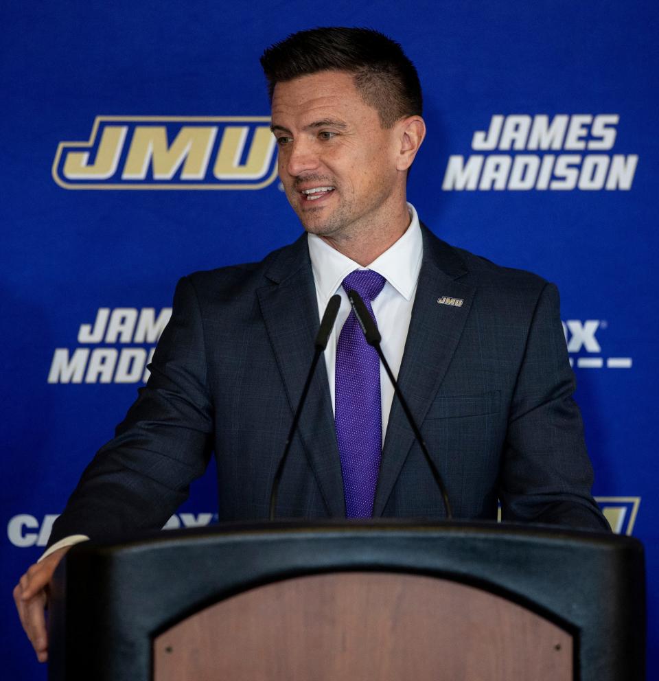 Former Holy Cross football coach Bob Chesney speaks during Tuesday's news conference at James Madison.