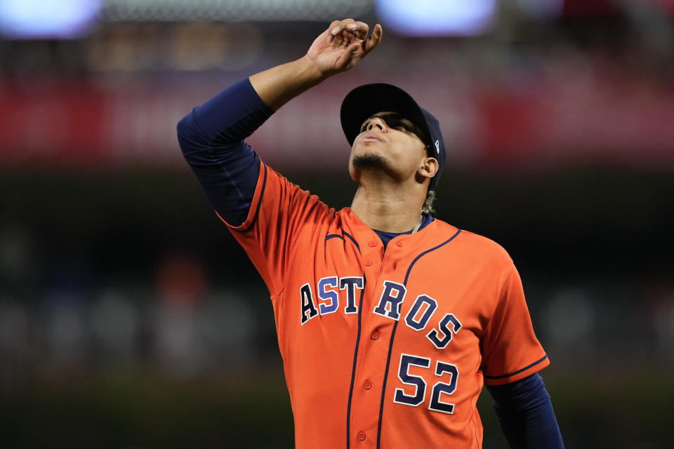 Houston Astros relief pitcher Bryan Abreu celebrates the last out of the seventh inning in Game 5 of baseball's World Series between the Houston Astros and the Philadelphia Phillies on Thursday, Nov. 3, 2022, in Philadelphia. (AP Photo/Matt Slocum)