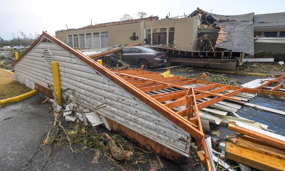 Damage to the Selma Country Club is seen in Selma, Ala., after a storm ripped through the city on Thursday afternoon.