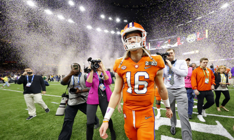 Clemson QB Trevor Lawrence walks off the field after the college football playoff national title.