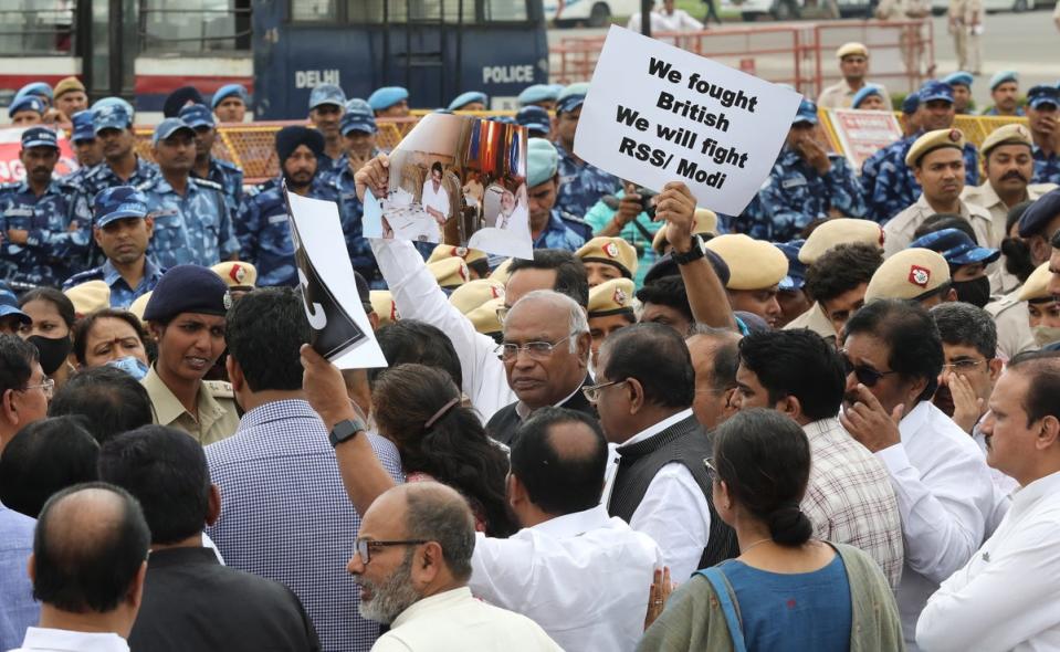 Members of parliament representing India’s opposition parties protest in New Delhi on Friday (EPA)