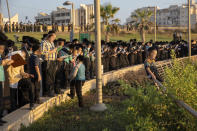 Ultra-Orthodox Jews of the Kiryat Sanz Hassidic sect pray on a hill overlooking the Mediterranean Sea as they participate in a Tashlich ceremony during a nationwide three-week lockdown to curb the spread of the coronavirus in Netanya, Israel, Thursday, Sept. 24, 2020. Israel moved to further tighten its second countrywide lockdown as coronavirus cases continued to soar. (AP Photo/Ariel Schalit)