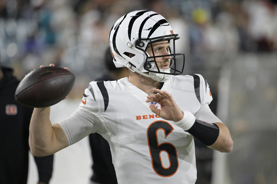 Cincinnati Bengals quarterback Jake Browning (6) warms up before an NFL football game against the Jacksonville Jaguars, Monday, Dec. 4, 2023, in Jacksonville, Fla. (AP Photo/Phelan M. Ebenhack)