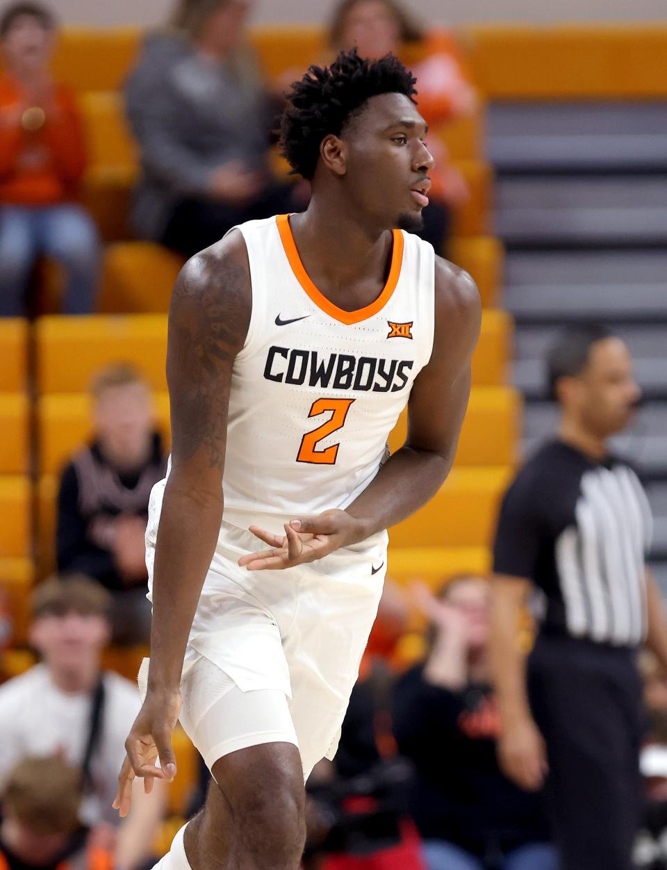 Oklahoma State's Eric Dailey Jr. (2) celebrates a 3-point basket in the first half of the college basketball game between the Oklahoma State Cowboys and the Chicago State Cougars at Gallagher-Iba Arena in Stillwater, Okla., Wednesday, Jan. 3, 2024.