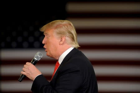 Republican U.S. presidential candidate Donald Trump speaks at a town hall event in Appleton, Wisconsin, March 30, 2016. REUTERS/Mark Kauzlarich