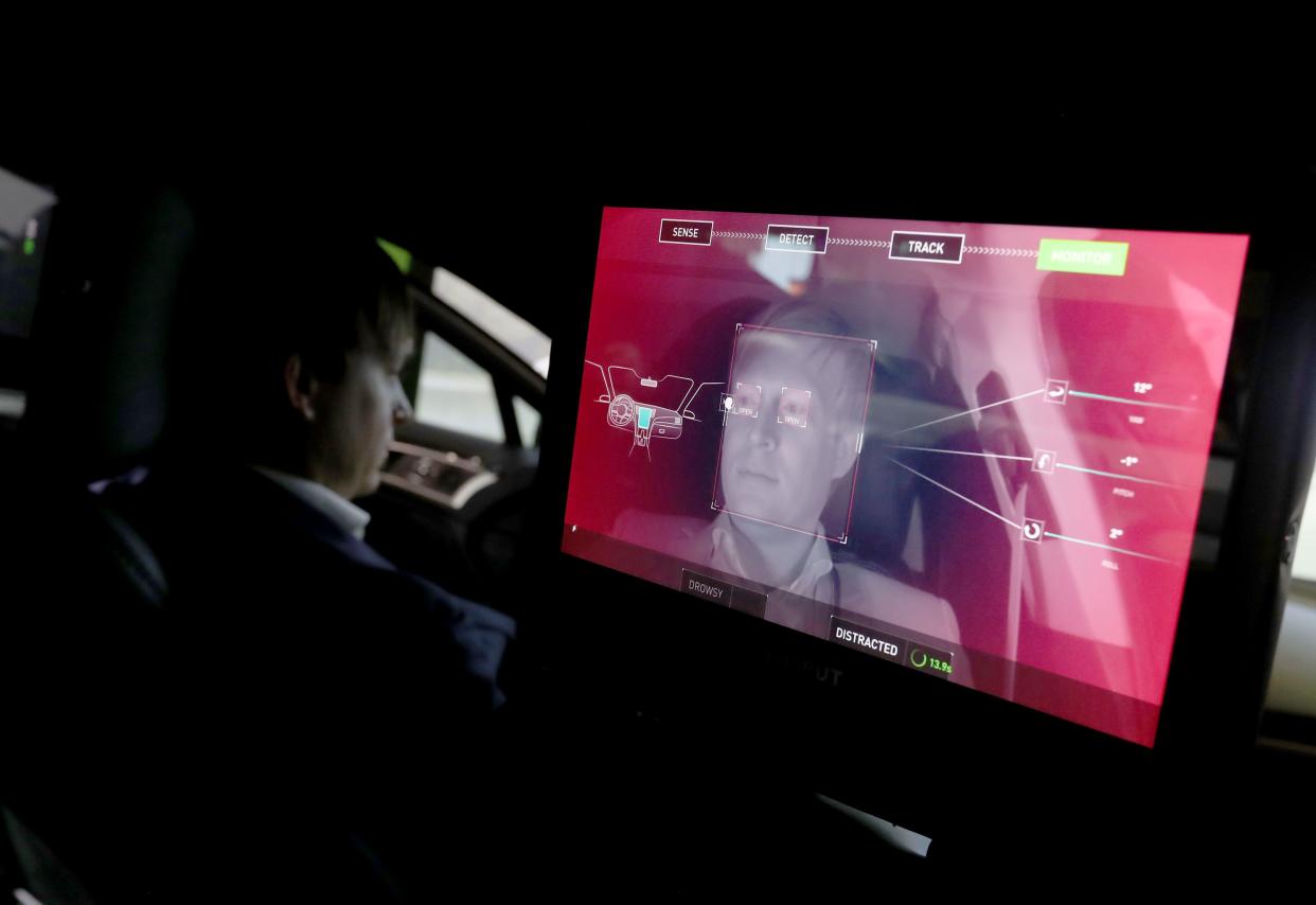 A camera monitors the driver of an Nvidia self-driving car inside the Nvidia booth during CES 2019 at the Las Vegas Convention Center on January 8, 2019 in Las Vegas, Nevada.