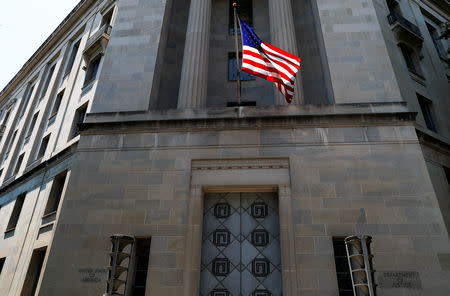 The U.S. Department of Justice headquarters building is seen after Deputy U.S. Attorney General Rod Rosenstein announced grand jury indictments of 12 Russian intelligence officers in special counsel Robert Mueller's Russia investigation in Washington, U.S., July 13, 2018. REUTERS/Leah Millis/Files