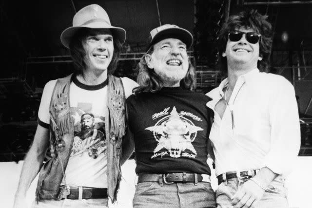 Bettmann Archive Neil Young, Willie Nelson and John Mellencamp at Farm Aid in 1985.