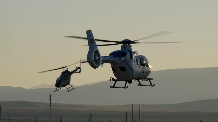 Helicopter recovery teams depart the Michael Army Air Field before the arrival of a space capsule carrying NASA’s first asteroid samples on Sunday, Sept. 24, 2023, to a temporary clean room at Dugway Proving Ground, in Utah. The Osiris-Rex spacecraft released the capsule following a seven-year journey to asteroid Bennu and back. (AP Photo/Rick Bowmer)