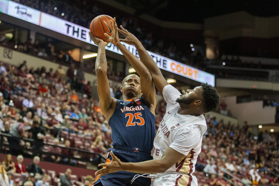 Virginia forward Mamadi Diakite (25) shoots next to Florida State forward RaiQuan Gray (1) during the first half of an NCAA college basketball game in Tallahassee, Fla., Wednesday, Jan. 15, 2020. (AP Photo/Mark Wallheiser)