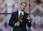 AP Comeback Player of the Year, Tennessee Titans' Ryan Tannehill speaks at the NFL Honors football award show Saturday, Feb. 1, 2020, in Miami. (AP Photo/David J. Phillip)