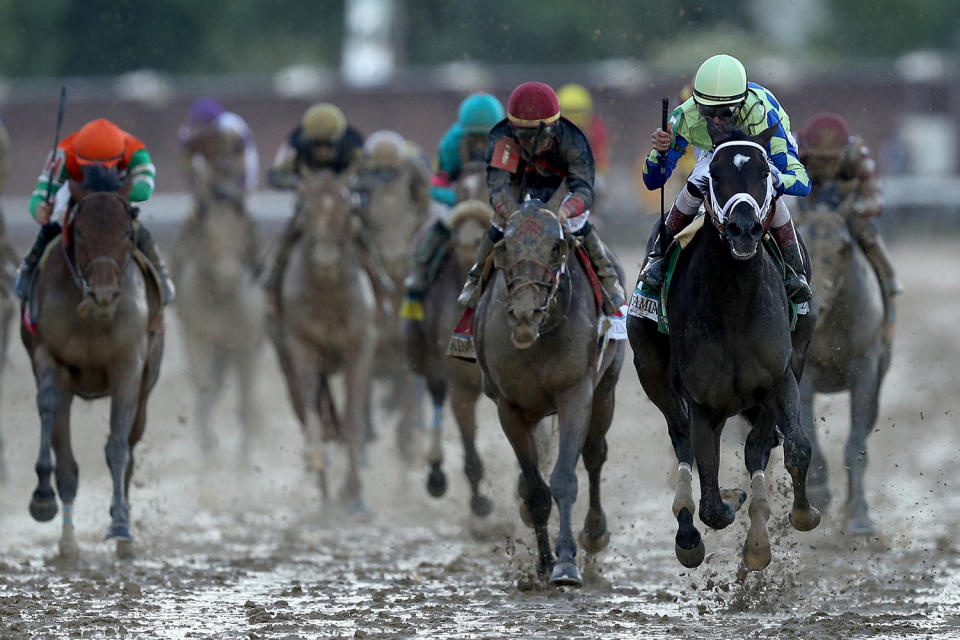 <p>Jockey John Velazquez celebrates as he guides Always Dreaming (5) across the finish line to win the 143rd running of the Kentucky Derby at Churchill Downs on May 6, 2017 in Louisville, Kentucky. (Photo: Patrick Smith/Getty Images) </p>