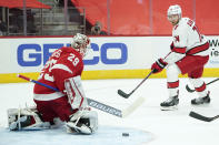 Detroit Red Wings goaltender Thomas Greiss (29) blocks a Carolina Hurricanes' Jaccob Slavin (74) shot in the first period of an NHL hockey game Thursday, Jan. 14, 2021, in Detroit. (AP Photo/Paul Sancya)