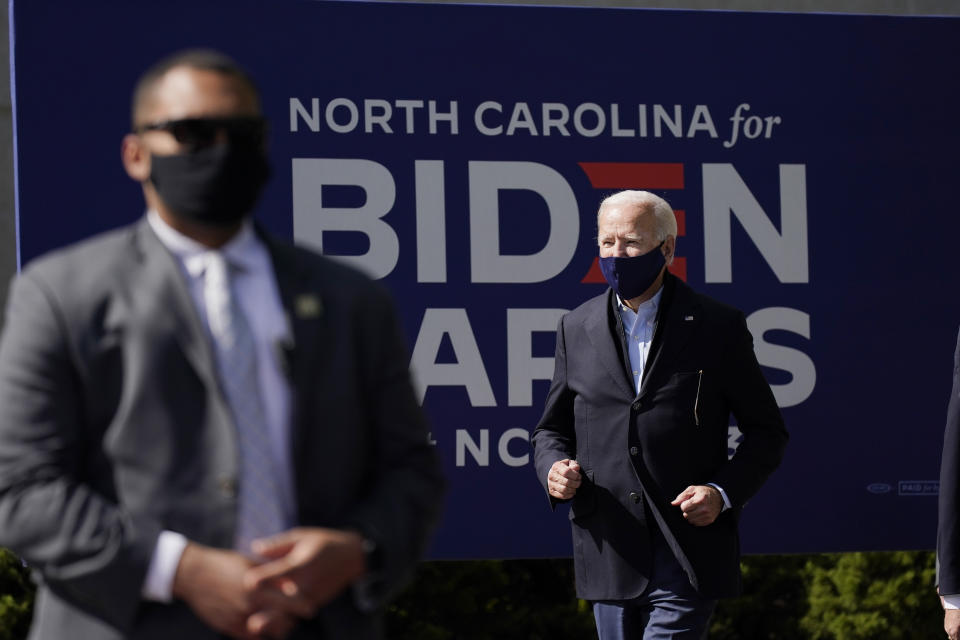 Democratic presidential candidate former Vice President Joe Biden arrives to speak during a campaign event at Riverside High School in Durham, N.C., Sunday, Oct. 18, 2020. (AP Photo/Carolyn Kaster)