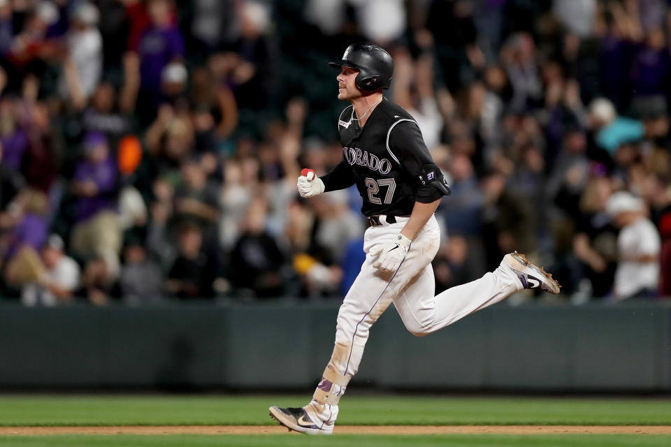 DENVER, COLORADO - SEPTEMBER 28: Trevor Story #27 of the Colorado Rockies circles the bases after hitting a walk off home in the tenth inning against the Milwaukee Brewers at Coors Field on September 28, 2019 in Denver, Colorado. (Photo by Matthew Stockman/Getty Images)