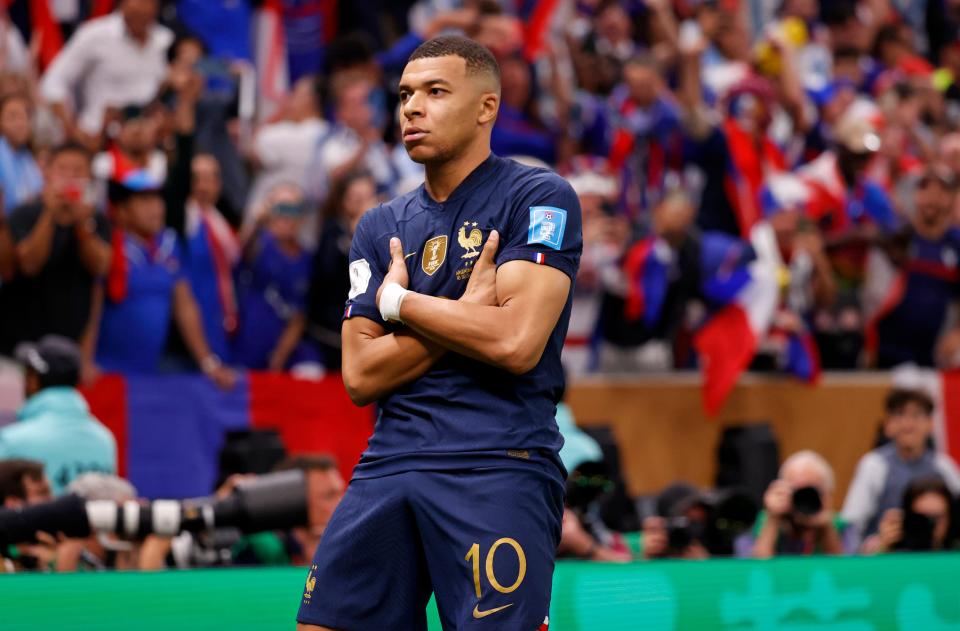 France forward Kylian Mbappe celebrates after scoring a goal against Argentina in extra time.